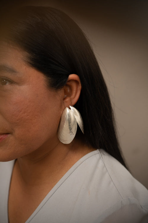 Aretes Tributo